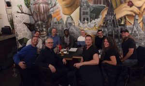 Photo of Ottawa bike rally organizers around restaurant table.